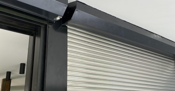 Partial In Eave Black FZ roller shutter